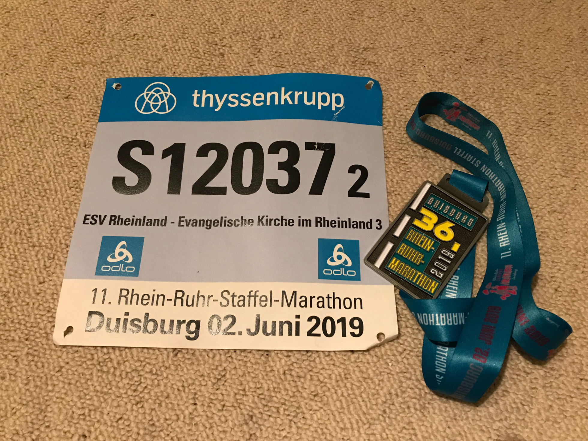 Rhein Ruhr Marathon - Startnummer und Finishermedaille